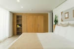 Кровать или кровати в номере Hotel NYX Cancun