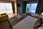 Кровать или кровати в номере Lucida Beach