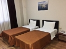 Кровать или кровати в номере Ventura Hotel