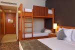 Двухъярусная кровать или двухъярусные кровати в номере Arcanus Side Resort - Ultra All Inclusive