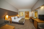 Кровать или кровати в номере Arcanus Side Resort - Ultra All Inclusive