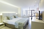 Кровать или кровати в номере Alua Hawaii Mallorca & Suites