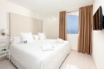 Кровать или кровати в номере Sol Arona Tenerife