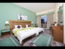 Кровать или кровати в номере Potamaki Beach Hotel