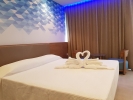 Кровать или кровати в номере Seasons Hotel (Adults Only)