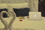 Кровать или кровати в номере Forty Winks Phuket Hotel