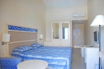 Кровать или кровати в номере Ephesia Holiday Beach Club