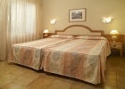 Кровать или кровати в номере HOVIMA Panorama