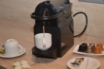 Принадлежности для чая и кофе в Anezi Tower Hotel