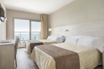 Кровать или кровати в номере Hotel Best Complejo Negresco