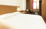 Кровать или кровати в номере Ibis Fujairah