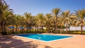 Бассейн в Coral Beach Resort Sharjah или поблизости