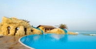 Бассейн в Coral Beach Resort Sharjah или поблизости