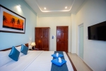 Кровать или кровати в номере Brenta Phu Quoc Hotel