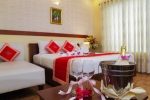 Кровать или кровати в номере Kim Hoa Resort