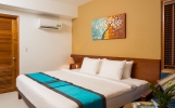 Кровать или кровати в номере Nadine Phu Quoc Resort