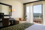 Кровать или кровати в номере Porto Carras Sithonia