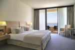 Кровать или кровати в номере Porto Carras Sithonia