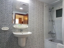 Ванная комната в Nejoum Al Emarat