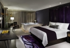 Кровать или кровати в номере Hard Rock Hotel Cancun - All Inclusive