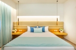 Кровать или кровати в номере Poseidon Palace