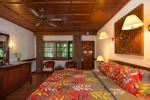 Кровать или кровати в номере Tropica Bungalow Hotel