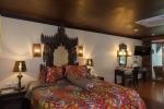 Кровать или кровати в номере Tropica Bungalow Hotel