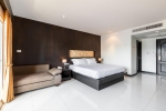 Кровать или кровати в номере Amata Patong
