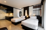 Кровать или кровати в номере Amata Patong