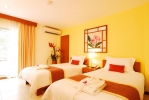 Кровать или кровати в номере Cosy Beach Hotel