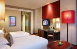 Кровать или кровати в номере Park Rotana Abu Dhabi