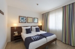 Кровать или кровати в номере Barut B Suites