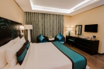 Кровать или кровати в номере Signature Hotel Al Barsha