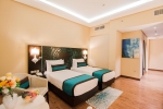 Кровать или кровати в номере Signature Hotel Al Barsha