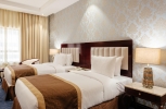 Кровать или кровати в номере Tulip Inn Al Khan Hotel