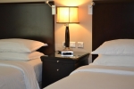 Кровать или кровати в номере Khalidiya Hotel