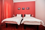 Кровать или кровати в номере Piazza Four Colours