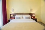 Кровать или кровати в номере Hotel Aisi