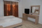 Кровать или кровати в номере Hotel Kompleks Joni