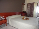 Кровать или кровати в номере Hotel Pavlina Beach