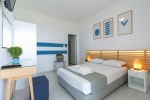 Кровать или кровати в номере Niforeika Beach Hotel