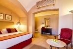 Кровать или кровати в номере Jaz Makadi Oasis Resort