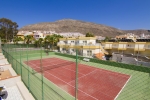 Теннис и/или сквош на территории Checkin Bungalows Atlántida или поблизости