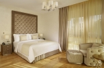 Кровать или кровати в номере Parklane, a Luxury Collection Resort & Spa, Limassol