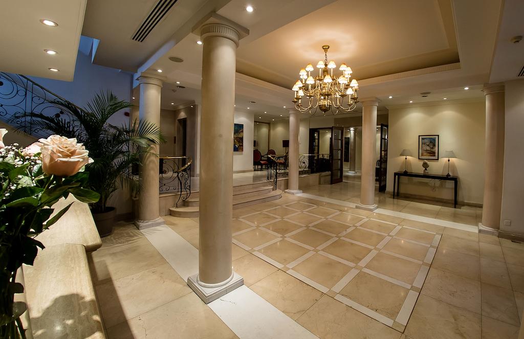 Отель Лобби или стойка регистрации в Curium Palace Hotel
