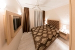 Кровать или кровати в номере Harmony Suites Saint Vlas 