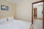 Кровать или кровати в номере Villa Sardinia Apartments 