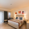 Кровать или кровати в номере Paloma Grida Resort & Spa
