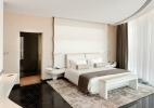 Кровать или кровати в номере Yas Hotel, Abu Dhabi