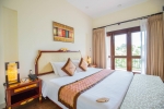 Кровать или кровати в номере Diamond Bay Resort & Spa